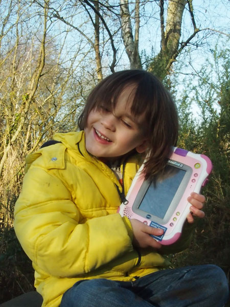 Milo hugging his innotab